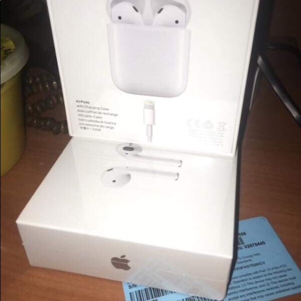 Two brand new air pods sealed.